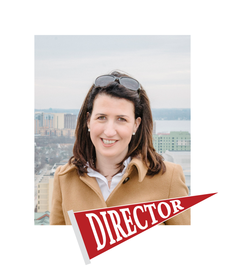 Headshot of Tracey Holloway with a red pennant that reads "DIRECTOR"